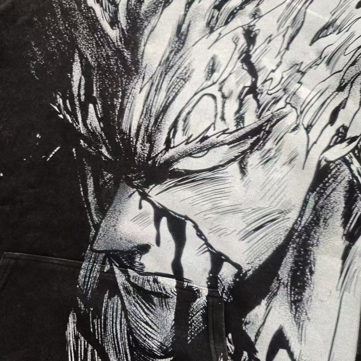 Real photo of the Garou Oversized Hoodie, close-up