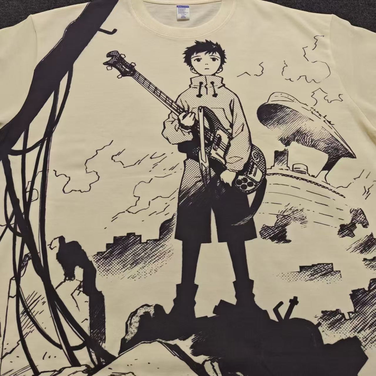Real photo of the Naota Bass Wasteland Manga Oversized T-Shirt