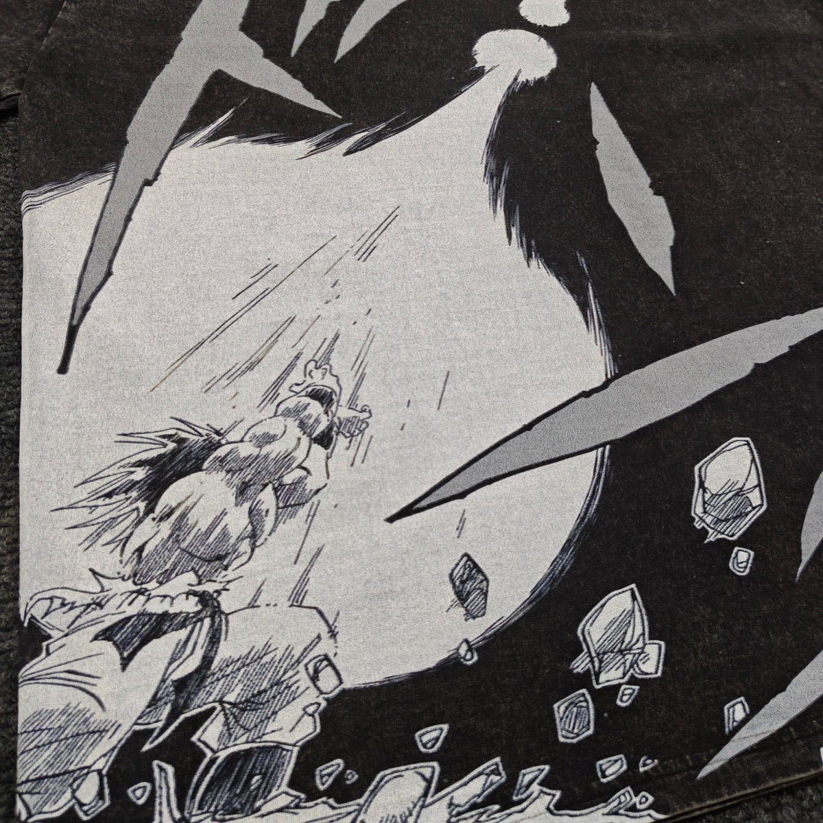 Real photo of the Kamehameha Washed Oversized T-Shirt, print close-up