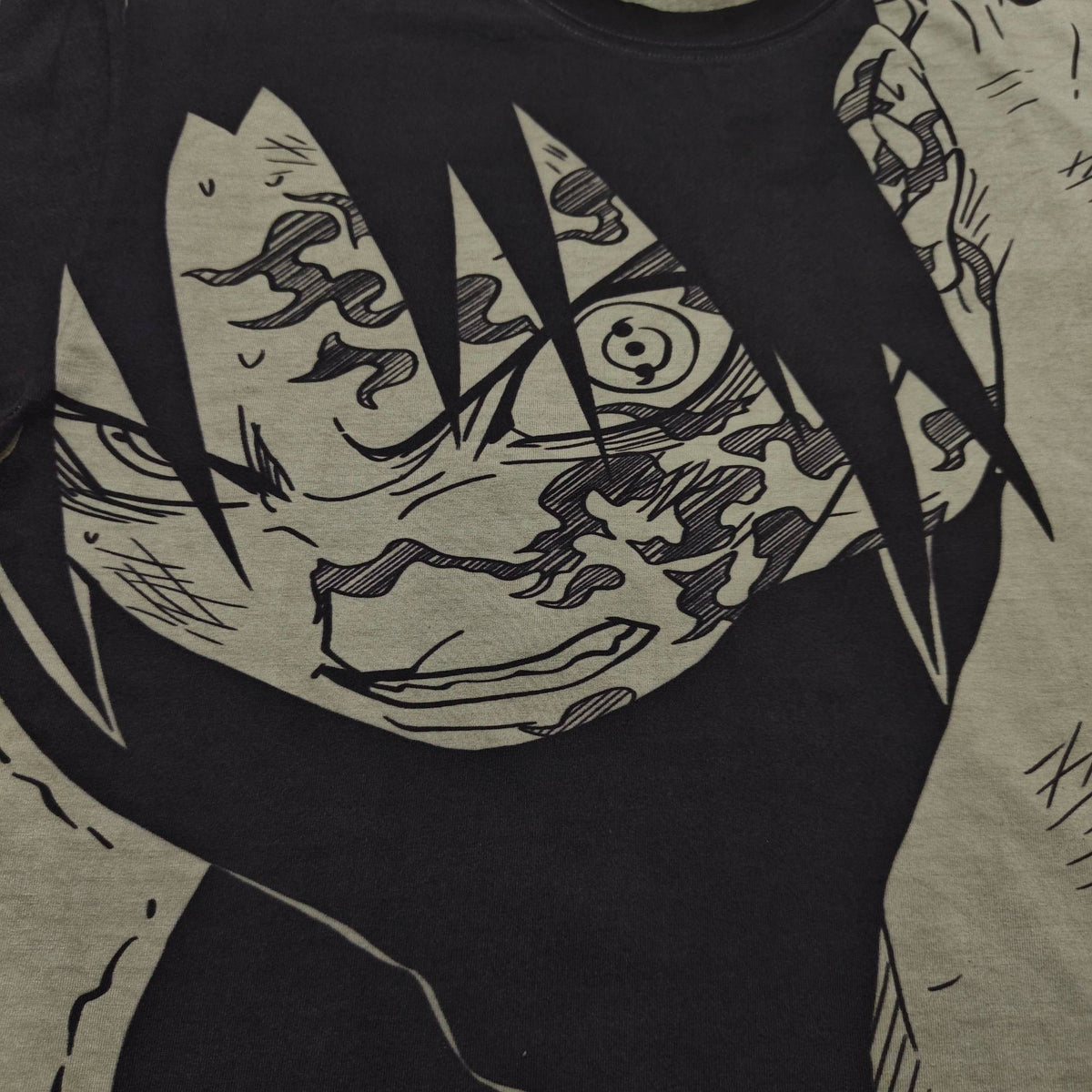 Real photo of the Sasuke Vintage Washed T-Shirt, print close-up